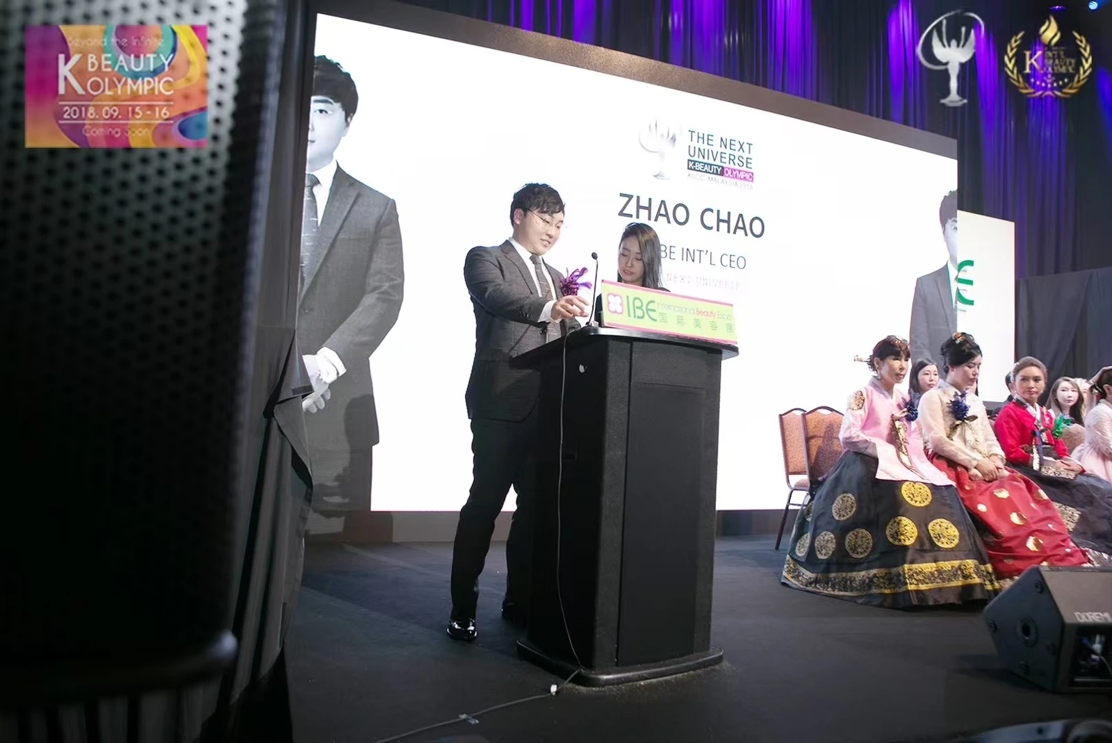 HEBE representative speaking at a beauty competition